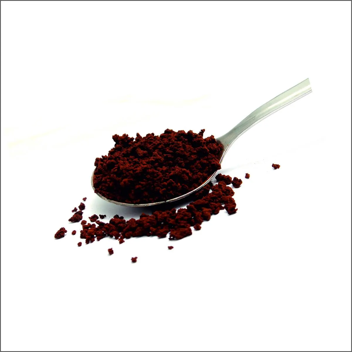 Sunoha instant granulated coffee — agglomerated granules on a spoon